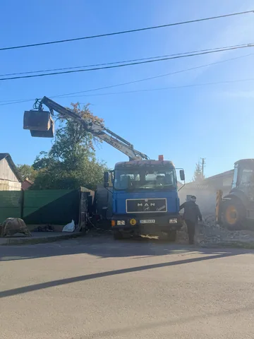 MAN із маніпулятором ATLAS 95.1 та грейферним ковшем